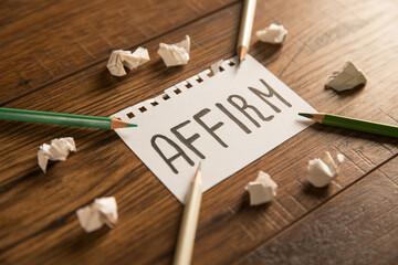 Lettering on paper Affirm and pencils