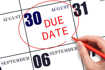 30th day of August. Hand writing text DUE DATE on calendar date August 30 and circling it. Payment...
