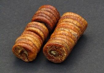 Dried figs on black background 
