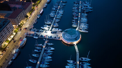 Pula ACI marina at night, aerial view, Croatia