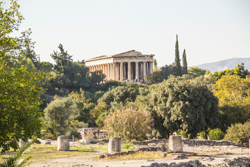 Fototapeta na wymiar The Temple of Hephaestus in Athena Archegetis is situated west side of the Roman Agora, in Athens, Greece