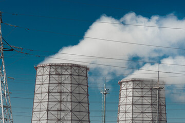 Toxic smoke is released from the cooling tower into the atmosphere and pollutes the environment,...