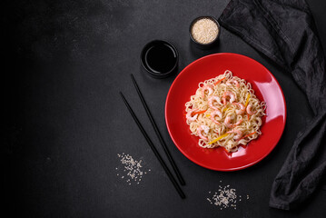 Delicious fresh rice noodles with shrimp, spices and herbs