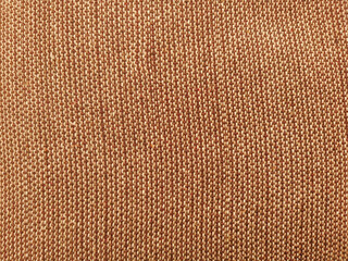 Brown cotton fabric texture. close up view