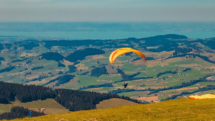 Beautiful alpine summer view with paragliders at the famous Ebenalp, Appenzell, Alpstein, Switzerland