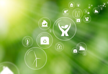 Green defocused background with sun rays and multiple icons inside floating bubbles as a symbol of protect environment and nature. Concept of sustainable ecology and carbon neutral air.