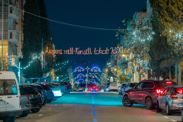 Road in sliema, malta with christmas writing 