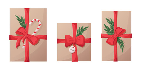 set of christmas gifts. craft paper boxes with Christmas tree branches and ribbons