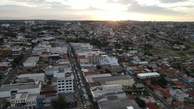 Drone flight over the city of Tel&ecirc;maco Borba/PR in the late afternoon, during sunset, flying over the houses