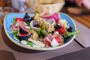 Summer salad with prosciutto, figs, parmigiano 