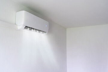  Air conditioner and wind flow on wall background