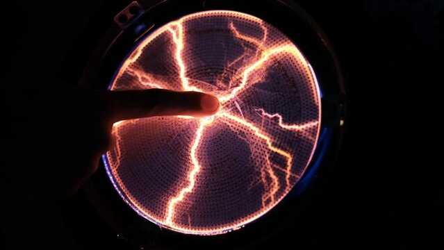 Electric shock waves. Child'd finger touching broken lamp. Power energy lightning spark. Dangerous electricity voltage strike.