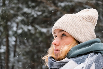 Winter.woman walks through winter snowy forest. Mental and physical health. Unity with nature.travel outdoors, hiking, spending time outdoors,winter travel,slow life,christmas forest.