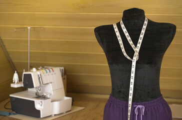 Background image of fashion designer sewing workshop.