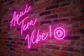 Brazilian write pink neon in brick wall