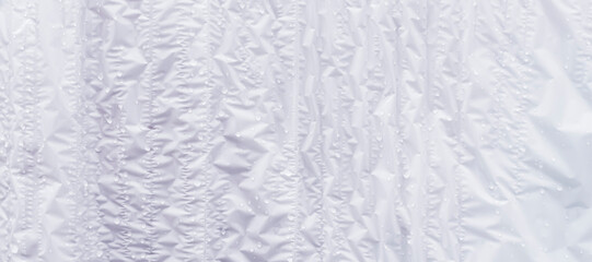 The plastic film is covered with droplets