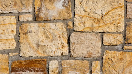 weathered building walls. Stone wall photos for background.