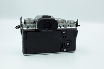 rear view of a digital camera on a white background. Photo and video cameras.