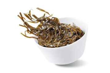 Seaweed in a bowl on a white isolated background