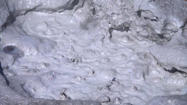 Semi-thermal area, geothermal fluid. Mineral hot springs is confined to post-volcanic phase, white ammonium chloride. Kamchatka