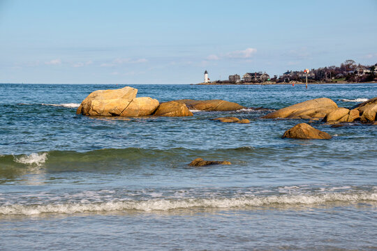 veiw of annisquam light house froom wingaersheek beach,