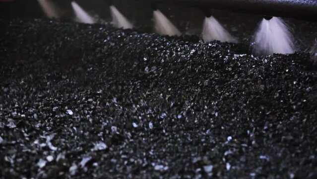 Conveyor line washes dirty ore and coal for further steel production. Anthracite and hard coal sorting equipment