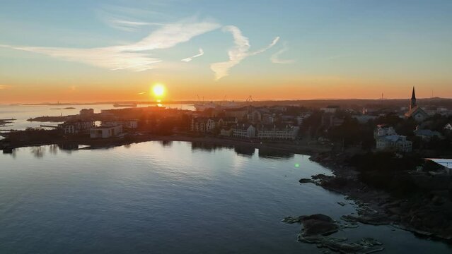 Aerial view of the Hanko cityscape, sunrise in Uusimaa, Finland - tracking, drone shot