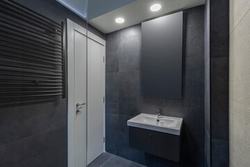 Bathroom interior with glass shower cabin