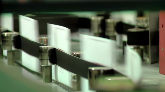 Letters Moving on Conveyor Belt Inside Automated Postal Sorting Machine - 4K