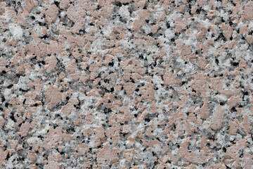 Texture of granite stone wall, close up abstract background