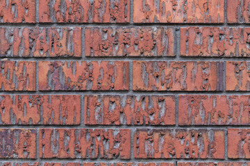 Old red brick wall close up textured background