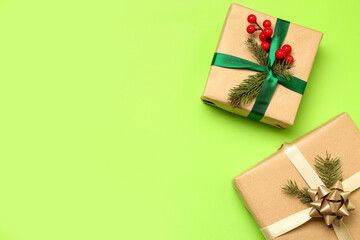 Beautiful Christmas gifts on green background