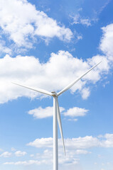 Wind turbines in the blue sky on a sunny day, produced electricity from pure energy.
