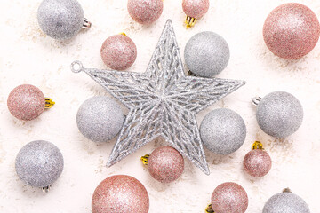 Shiny Christmas balls with star on white background