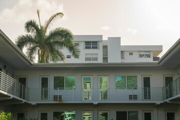 Facade of an apartment with reflective doors and windows at Miami, Florida
