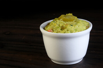 guacamole avocado tomato jalapeno cilantro onion and spices mexican food