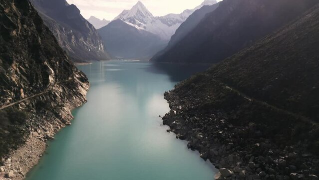 Drone Fly above Blue Peaceful Lake Snow Peak Mountain, Laguna Paron, Huaraz Peru Pristine Unpolluted Landscape of Mother Earth