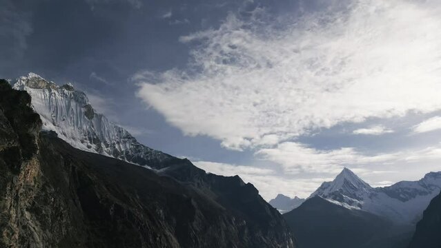 Inspirational Mountain Peaks Aerial Drone in Andean Cordillera, Paron Lake Peru Trekking Destination, Idyllic Sky Horizon and Pure Water