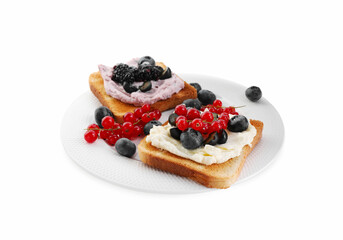 Tasty sandwiches with cream cheese, blueberries, red currants and blackberries on white background