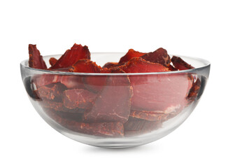 Glass bowl of delicious beef jerky isolated on white