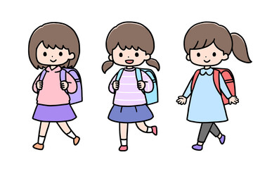 カラフルなランドセルを背負って歩く小学生の女の子3人