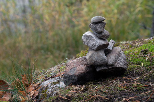 View of the pyramid of stones (tour or gury) on the shore of Lake Ladoga, Ladoga skerries, Karelia, Russia