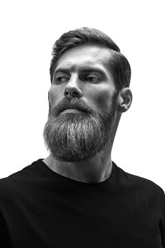 Black and white portrait of male beard and moustache. Sexy male, brutal macho, hipster. Caucasian bearded model man isolated on white