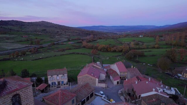 Aerial view of the old and small village "Santiago del Collado" in Avila at sunset, Spain.