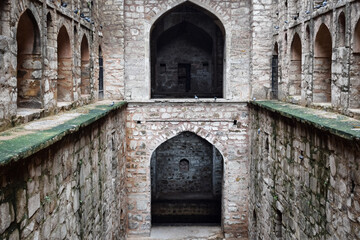 Fototapeta na wymiar Agrasen Ki Baoli (Step Well) situated in the middle of Connaught placed New Delhi India, Old Ancient archaeology Construction