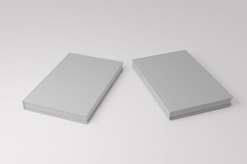 Hardcover book template, two blank books lying on white background for design purposes, 3d rendering
