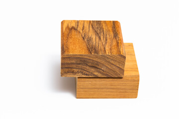 Natural Teak wood cube on white background