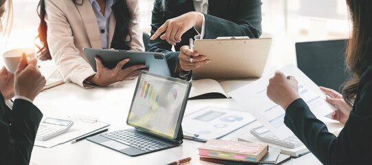 Cropped shot of diverse coworkers working together in boardroom, brainstorming, discussing and...