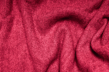 Fototapeta na wymiar Magenta color woolen cashmere texture close-up