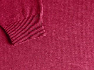 Sweater in red color of year 2023 Viva Magenta. Demonstrating color of 2023 year for fashion and clothing industry. Copy space for text or design
